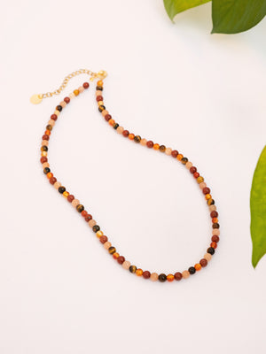 choker con pietre naturali. collana girocollo cristalli naturali. giunquilla gioielli per il sacro femminile. gioielli per chakra, energetici. yoga tantra. inossidabili. occhio di tigre, corniola eliolite pietra del sole, diaspro